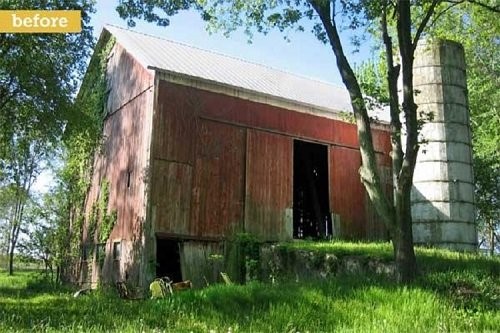 A barn with trees in the background
